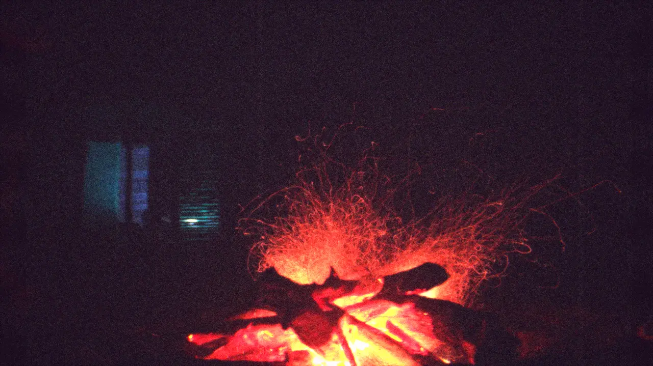 Glowing campfire embers on Kodachrome reversal stock — Kodachrome