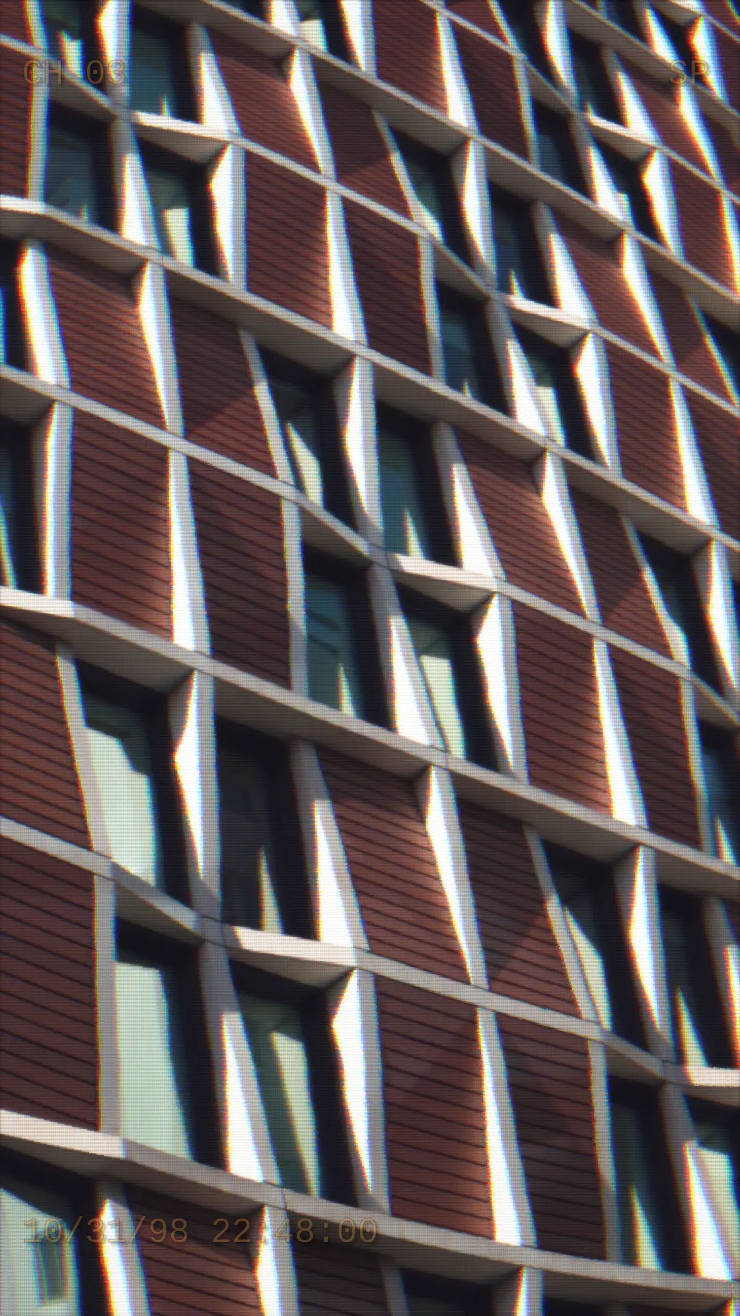A circular concrete facade on a Hi8 camcorder — Hi8