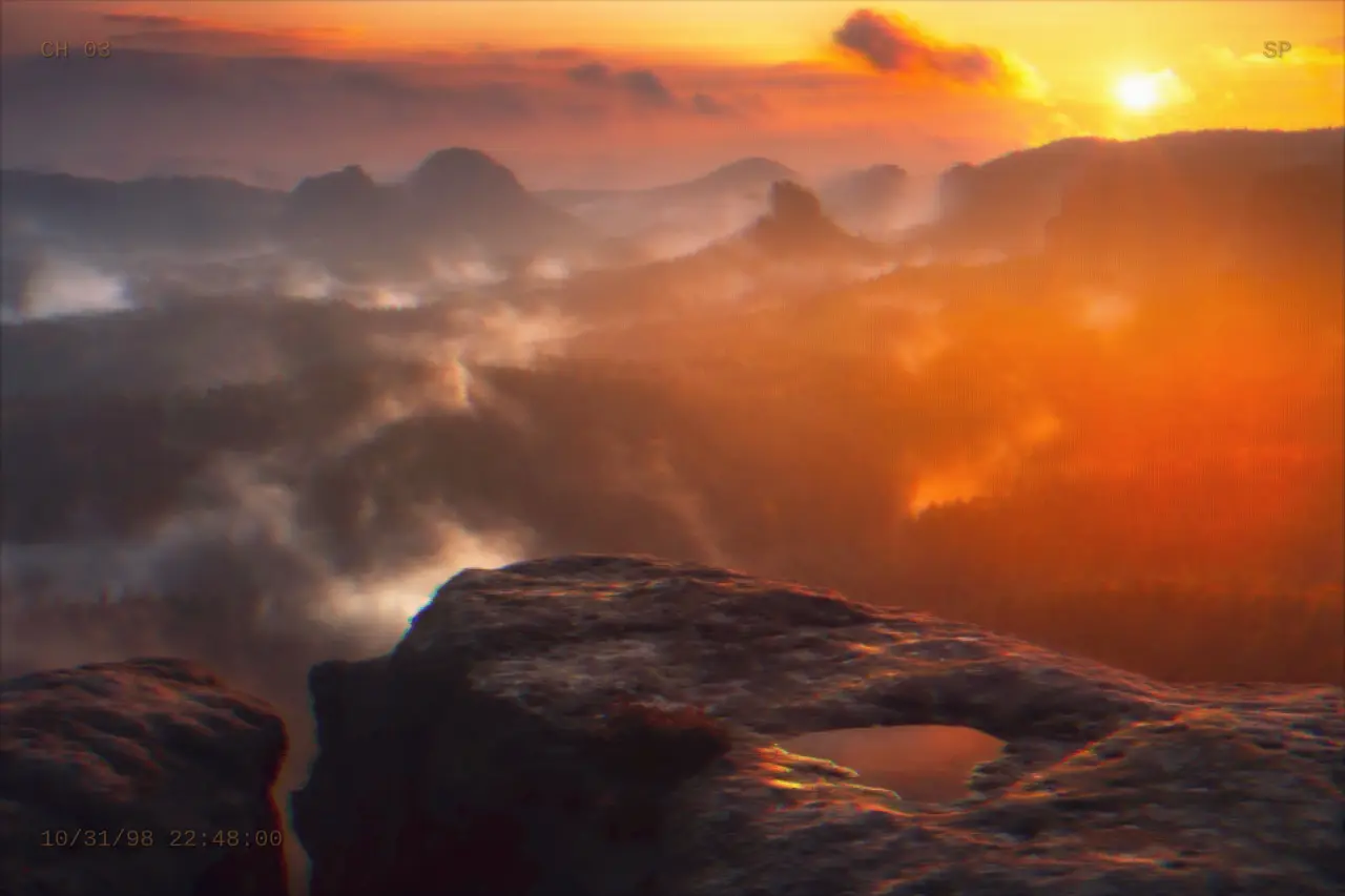 A misty mountain sunrise on a Hi8 camcorder — Hi8